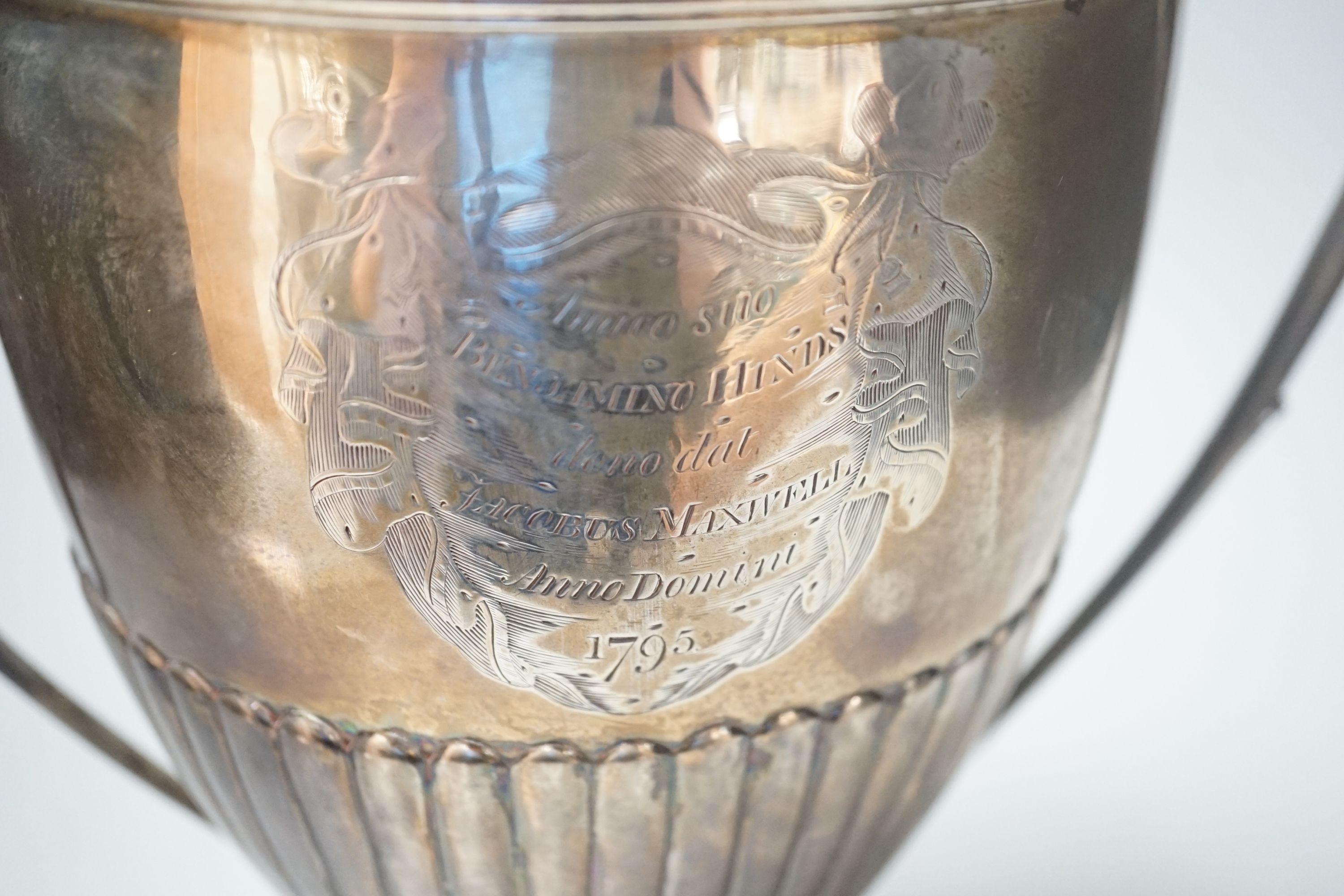 A George III demi fluted silver two handled urn shaped pedestal presentation trophy cup and cover, by William Fountain